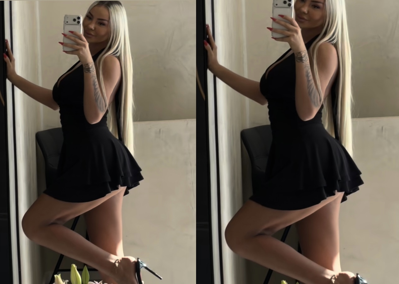 Benita me fustan të shkurtë, i qet të pasmet ‘në fushë’